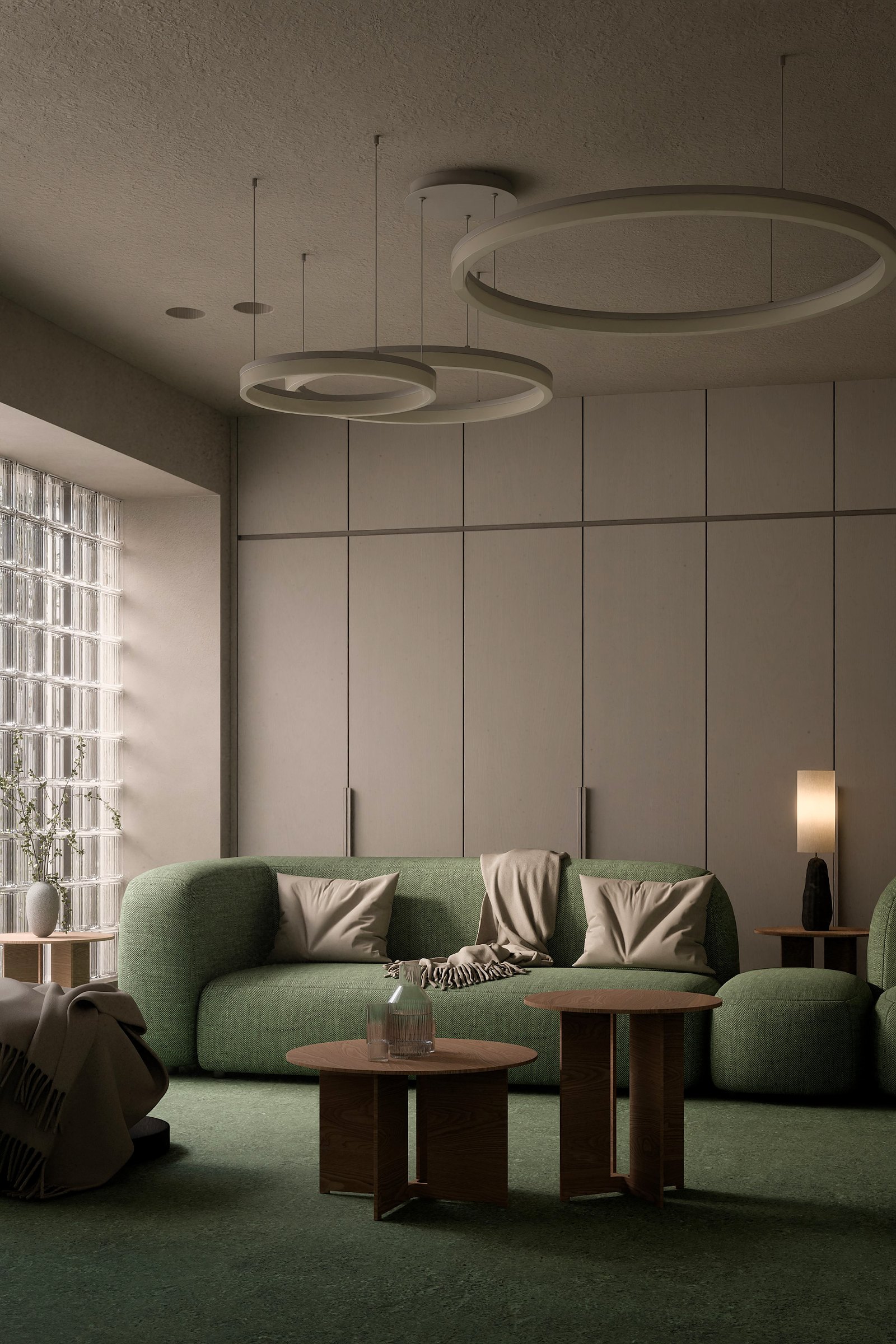 Green Room, view 2: Green upholstery, ring lamps and a glass-block window.